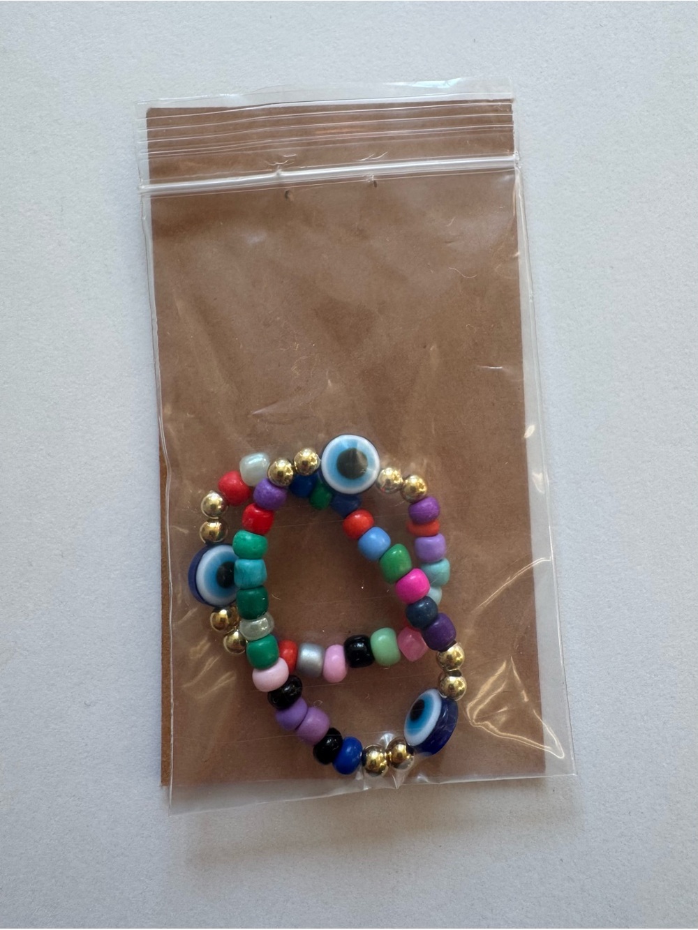 Multicolor Beaded Stretch Bracelet with Gold Accent - Blue Eye Charm